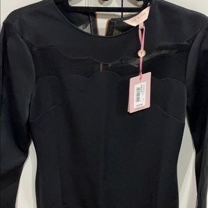 Black long sleeve dress, scalloped mesh detail